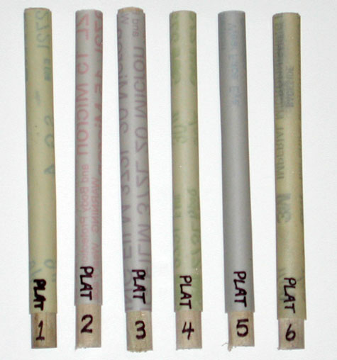 Six varieties of platinum micro-finishing film, wrapped around half-round sticks 