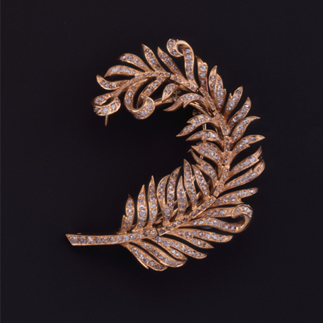 Vintage jewelry, such as this French 18K yellow gold and diamond feather brooch, circa 1860, should be handled delicately and can be cleaned with just water and a soft, lint-free cloth. Photo by David Behl, © Janet Mavec & GIA.