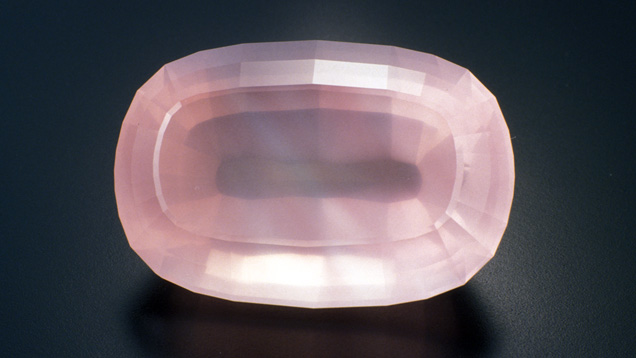 This fine-quality faceted rose quartz displays the gem’s appealing soft pink hues. - Photo by Robert Weldon, © GIA 