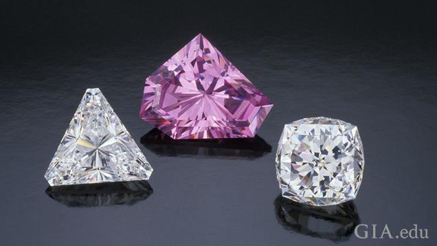 A colorful group of cubic zirconia set in jewelry - rings, earrings and bracelet – and loose.