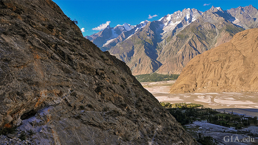 Landscape of Pakistan’s Shigar Valley between steep mountains where the March birthstone aquamarine mines are found.