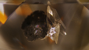 Wallastonite and CaSiO3-breyite in colorless diamond.