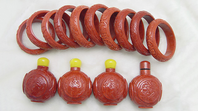 14 ornaments of coral veneer glued to matrix
