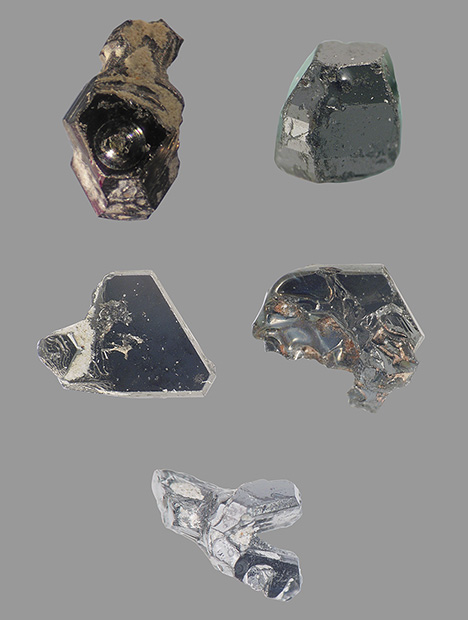 Several moissanite crystals