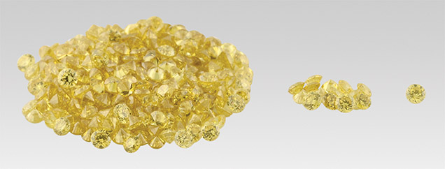 Group of intensely colored round yellow diamonds