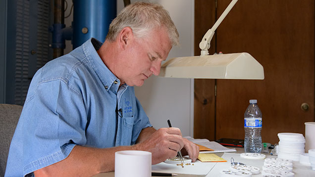 Man working on stones