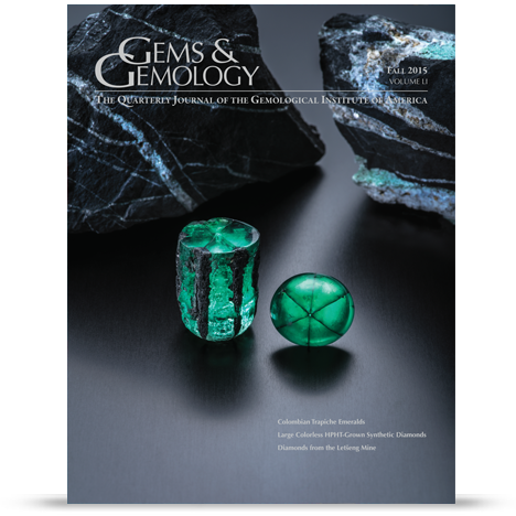 The lead article in this issue is an in-depth study on the geological formation and growth of Colombian trapiche emeralds. The cover photo shows a 58.83 ct. crystal specimen (left) and a 22.74 ct. cabochon (right), both displaying the material’s signature six-rayed pattern, from the renowned Peñas Blancas emerald region. The host rock, seen in the background, is carbonaceous shale containing veins of calcite, pyrite and minute crystals of low-grade emerald. Photo by Robert Weldon/GIA, courtesy of Jose Guillermo Ortiz and Colombian Emeralds Company, Bogota.