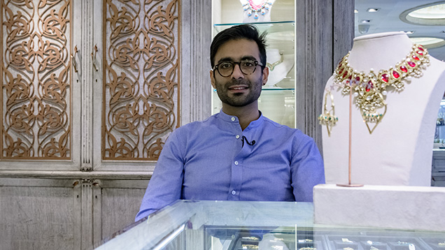 Man in jewelry store