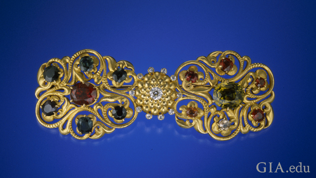 An intricate, golden brooch.