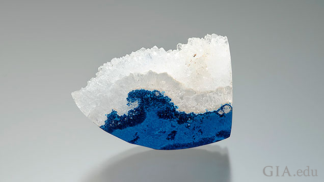 A blue base is with clear quarts mimics the feel of an ocean wave.