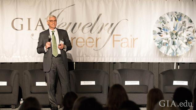 Image of GIA Governor Elliot Tannenbaum speaking at the Jewelry Career Fair 