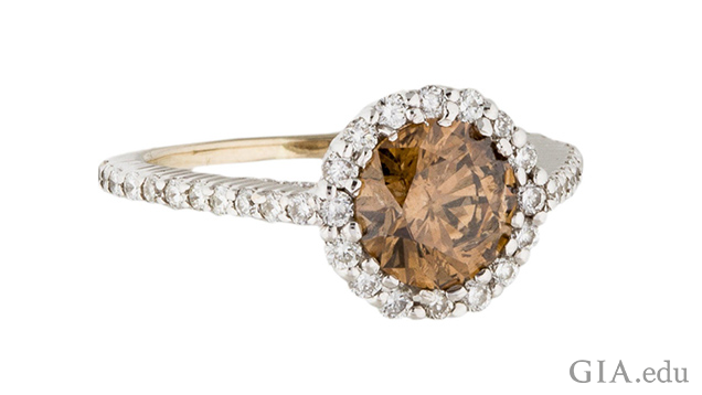 Image of white gold ring with brown diamond center stone surrounded by halo of white diamonds