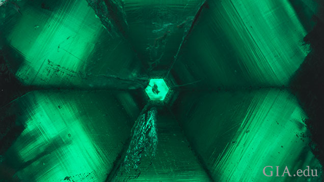 Looking down the crystal axis of a backlit 58.83 ct trapiche emerald