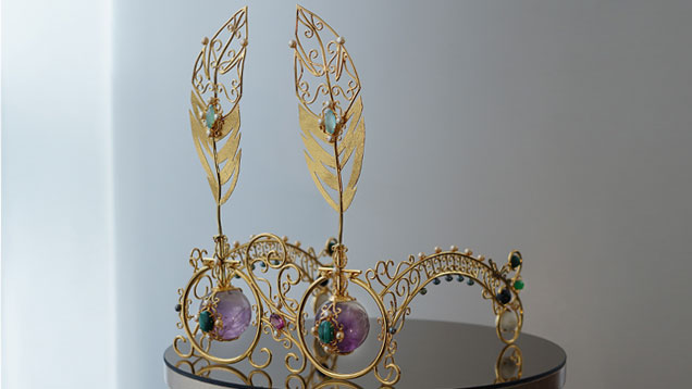 Art in the shape of eyeglasses decorated with gemstones