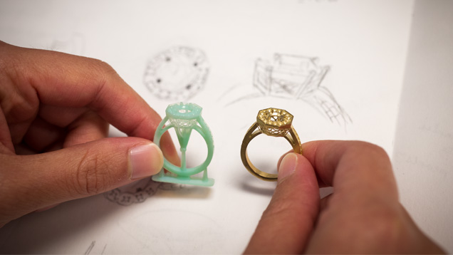 Jewelry Design technology students compare the visual communications of their designs to the 3-D-printed and cast prototypes. Photo by Kevin Schumacher