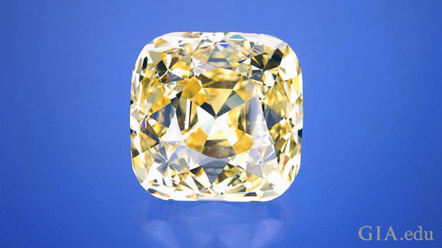 A large square cut yellow diamond.