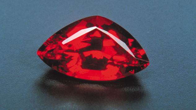 Deep red sunstone from the Ponderosa mine is marketed as spinel red. Although it’s not as hard as spinel or ruby, this sunstone type has a vivid scarlet hue that can be equally lovely. – Bart Curren