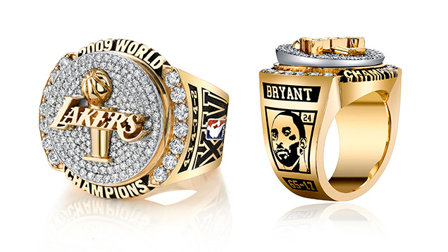 Images of the 2009 Los Angeles Lakers championship ring showing the top face and player facial profile side of the ring.