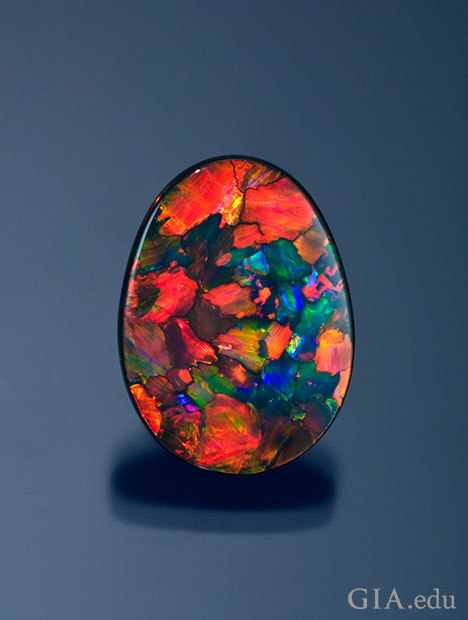 A 13.60 ct. black opal from Lightning Ridge, Australia shows off the orange, red, blue and green colors it is known for.