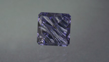 This iolite was artfully carved to display its best qualities. – Lydia Dyer, gem courtesy John Dyer & Co