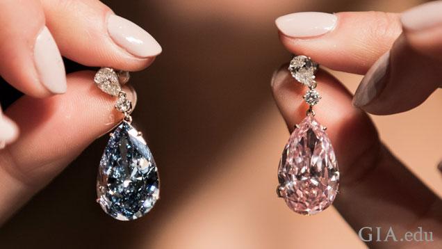 The Apollo and Artemis diamonds, twin fancy colored diamonds of 14.54 cts and 16 cts, respectively, sold for $57 million at Sotheby’s in May. Photo courtesy of Sotheby’s