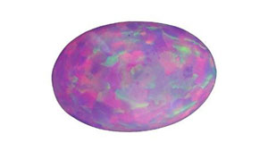 This 5.90 ct hydrophane-type opal showed gemmological features consistent with material from Wollo Province, Ethiopia. The purple colour proved to be caused by dye.
