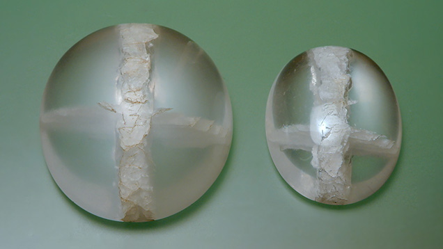 Quartz cabochons with cross-shaped quartz inclusions.