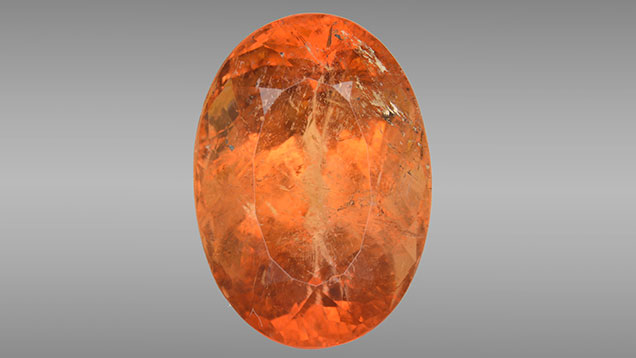 A 5.85 faceted orange eosphorite.