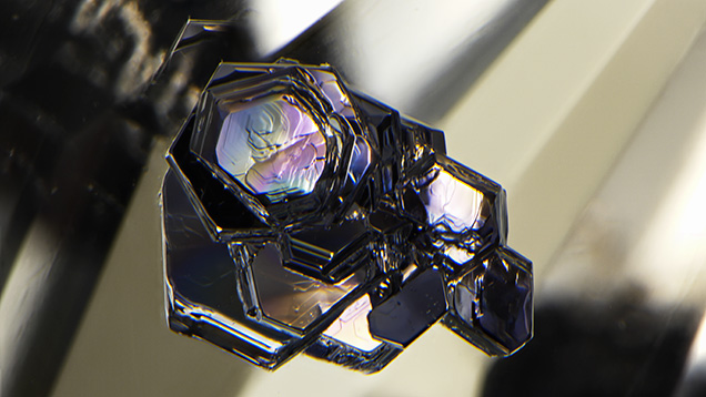 Molybdenite crystal inclusions in topaz.