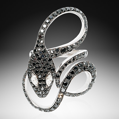 Snake ring with black and colorless diamonds