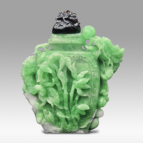 Carved snuff bottle of emerald from Malipo, China