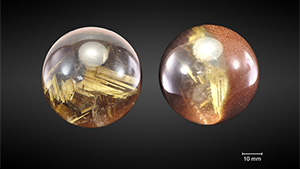 Half colorless and half brown rutilated quartz sphere.