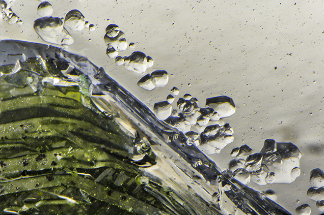 Numerous willemite crystals in Nigerian topaz.