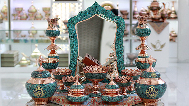 Turquoise inlay on copper handicrafts in the Aghajani Gallery, Tehran