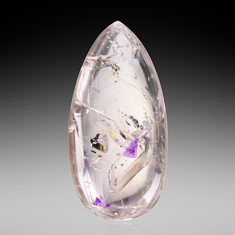 This pear-shaped quartz contained several fluid inclusions.