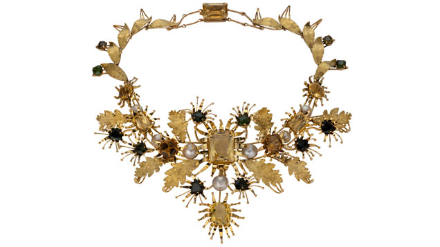 "Floral Wreath" is made of citrine, tourmanline, cultured mabe pearl, and 14K gold. Designed for the Duchess of Windsor. 