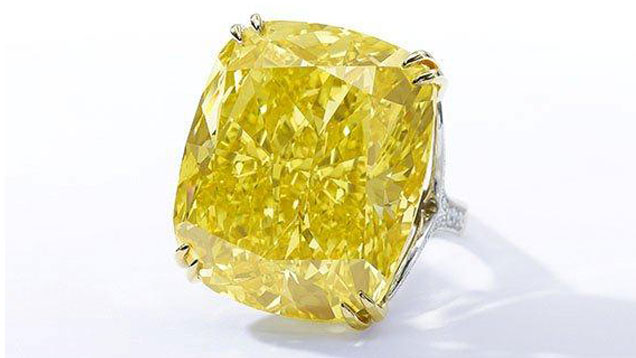 The 100.09 ct Vivid yellow from Laurence Graff brought $16.3 million at Sotheby’s Geneva sale in May 2014, the most expensive yellow diamond ever sold at auction. Photo courtesy of Sotheby’s