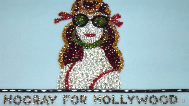 Starlet in sunglasses above title “Hooray for Hollywood"