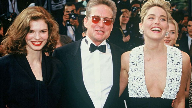 Jeanne Tripplehorn, Michael Douglas, Sharon Stone on the Red Carpet at the premier of Basic Instinct in 1992. © Martin Katz, Ltd.