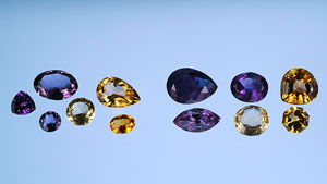 天然紫水晶和黄水晶（右边的宝石分组）及其合成类似物（左边的宝石分组）展现出类似的成色范围。