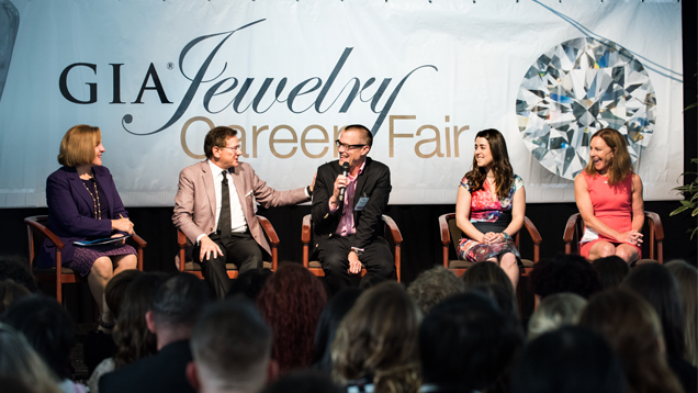 The opening panel, “Job Success in Today’s Market.” L to R: Susan Jacques, GIA’s president and CEO;  Martin Katz, founder and CEO of Martin Katz, Ltd.; Mark Smelzer, publisher of JCK magazine and JCKonline.com; Melanie Goldfiner of Rahaminov Diamonds Inc.; and Mary Todd-McGinnis, vice president of sales for Ben Bridge Jeweler. Photo by Kevin Schumacher; © GIA