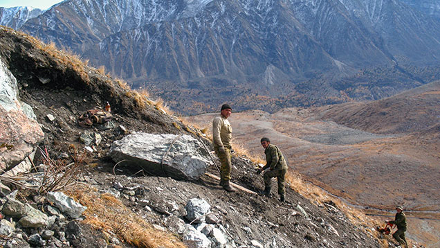 Miners on a mountainside in Siberia