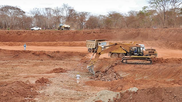 Excavators and trucks at pit 3