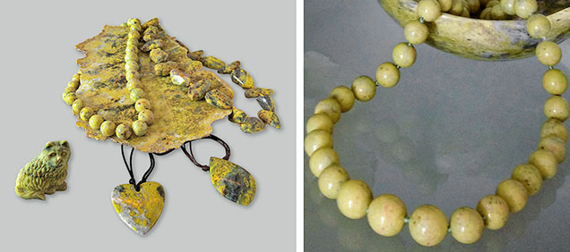 Necklaces, pendants, statuette, and slab of serpentine 