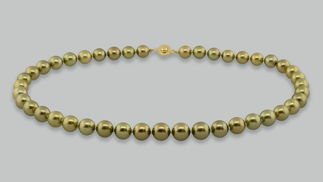 Strand of 43 treated “pistachio” pearls