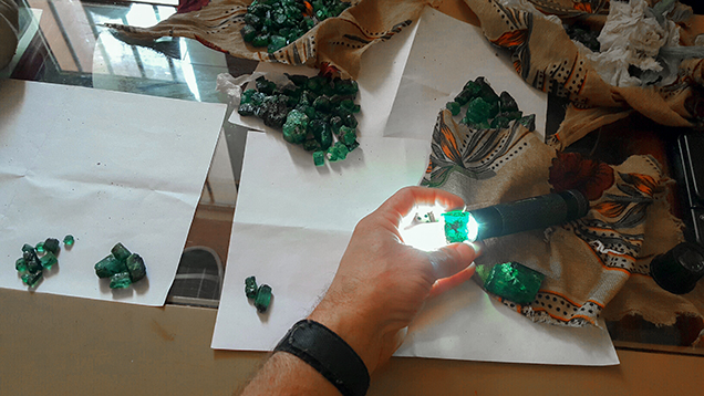 Michael Nemeth sorts Ethiopian emerald