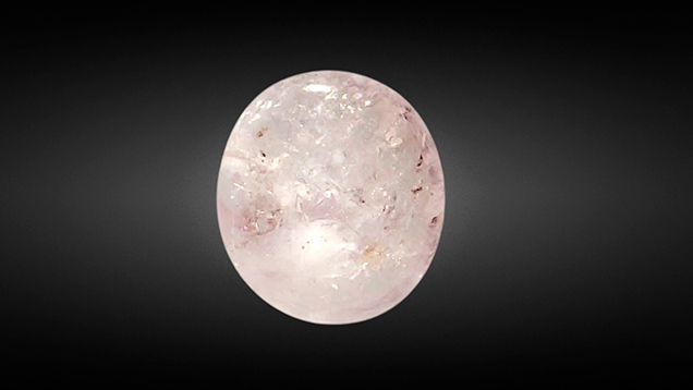 Pink sapphire with glass filling.