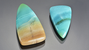 Indonesian opal cabochons, 6.94 and 3.79 ct.