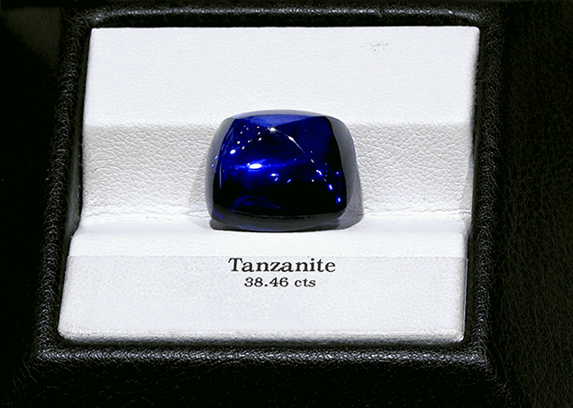 This 38.46 ct sugarloaf-cut tanzanite was purchased on the secondary market.