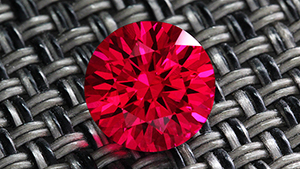 The Geometeer, a synthetic ruby with a hybrid cut by Rex Guo.